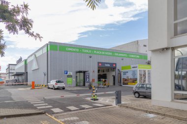 Leroy merlin store building with parking lot, signage, and entrance, offering various construction and diy materials