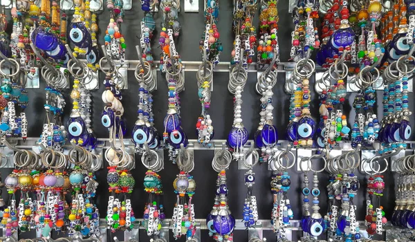 Keychains with beads from the evil eye are a popular tourist souvenir and a talisman from the evil eye, a symbol of protection from evil looks. Key chains with the inscription Alanya in Turkey