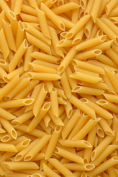 Raw Penne Pasta Background — Stock Photo, Image