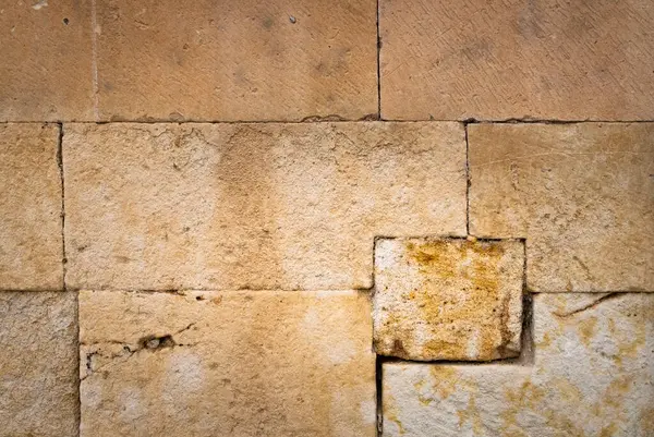 Большая Каменная Стена Старого Здания Большим Количеством Текстур Теплых Тонов — стоковое фото