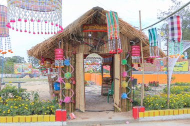 An ancient merit-making tradition using artifacts and decorative flags according to the religious beliefs of communities in the Northeast of Thailand.