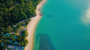 4K Aerial Top View of Nathon Beach, Koh Samui. Beach, sea and sand. Drone view of a beautiful white tropical sand beach on a summer day in Thailand. Top view empty and clean beach. Samui, Thailand