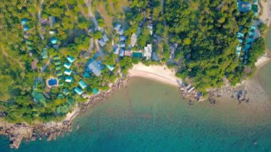 4k Drone Footage of the Beach at Mae Nam on Koh Samui in Thailand, Including Beachfront Resorts with Beautiful Clouds in the Sky and Crystal Teal Water