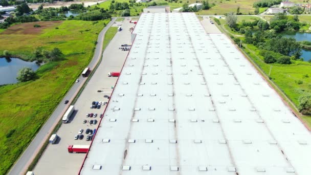 Aerial Shot Truck Attached Semi Trailer Leaving Industrial Warehouse Storage — Stock video
