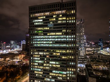 Amazingly beautiful City Business Center on the night with glittering lights from buildings, streets and traffic.  Illuminated skyscrapers and towers around 
