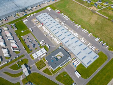 Modern European logistics warehouse for worldwide delivery of goods, warehouse, aerial view