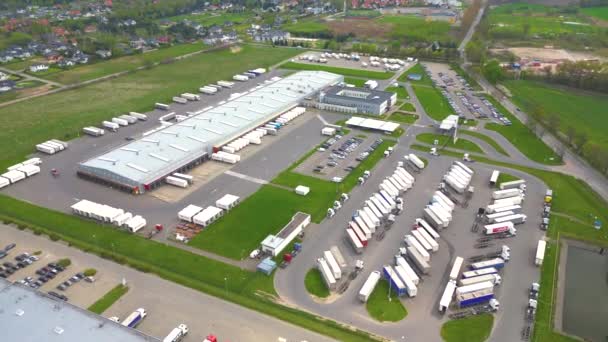 Aerial Shot Industrial Warehouse Loading Hub Many Trucks Cargo Trailers — Stock Video