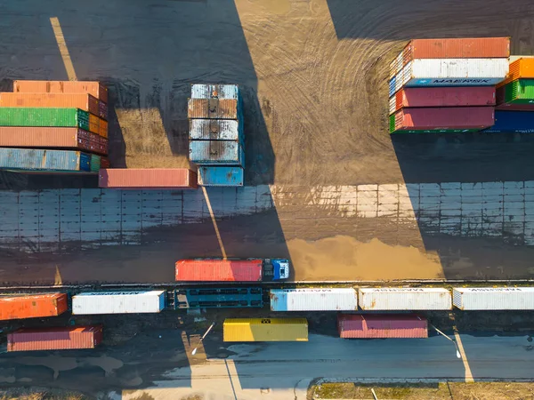 stock image Container in export and import business and logistics. Shipping cargo to harbor by crane. transport International. Aerial view