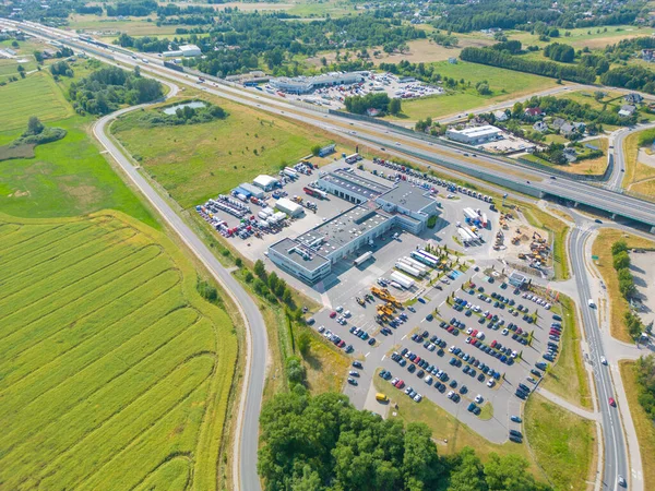 stock image Aerial view of storage and freight terminal with trucks and containers. Industrial background. Logistic center.