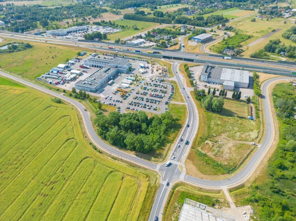 stock image Aerial view of storage and freight terminal with trucks and containers. Industrial background. Logistic center.