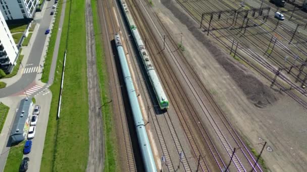 Scenic Aerial Shot Passenger Train Driving Sunset Train Tracks Surrounded — Vídeo de stock