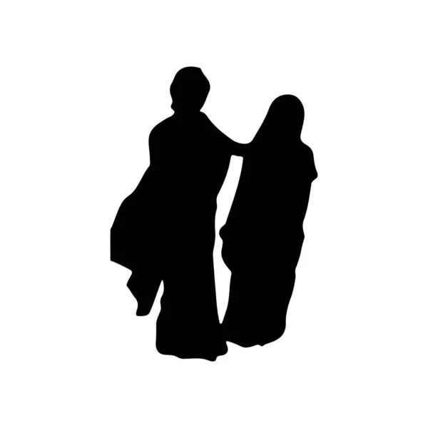 Hintli Çift Silueti. İki kadının birlikte durduğu şık bir vektör silueti. Arkadaşlığı ve güveni simgeliyor., 