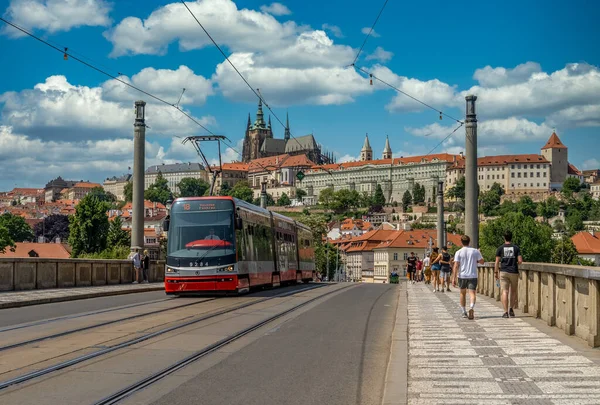 Red Tram Crosses Manes Bridge Prague Castle Background — Stock Photo, Image