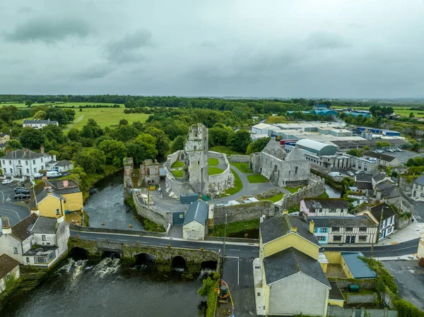 Aerial view of the Desmond castle in Askeaton Ireland in County Limerick on the river Deel, with Gothic Banqueting Hall, finest medieval secular building and remains of exquisite medieval fireplace