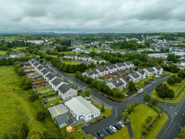 Aerial top down view of triplex and duplex house real estate community in Ireland in a cul-de-sac