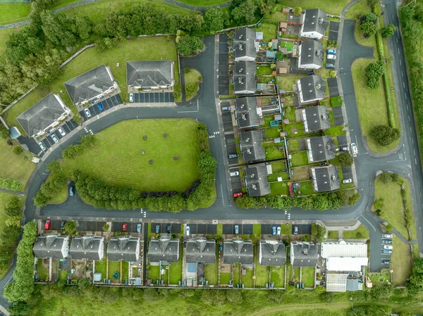 Aerial top down view of triplex and duplex house real estate community in Ireland in a cul-de-sac