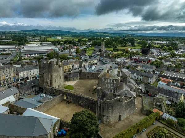 stock image Aerial view of Roscrea castle and town in Central Ireland with tower house keep, enclosing walls with circular tower and garden