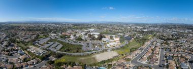 Aerial view of Miracosta public community college serving coastal North San Diego County in Oceanside California with parking lot for students clipart