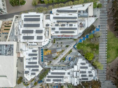 Aerial view of the UCSD student center with solar panels on the roof top clipart