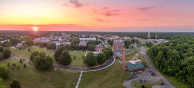 Aerial view of Virginia State University in Petersburg, Virginia Hall central building with stunning dramatic colorful sunset sky clipart