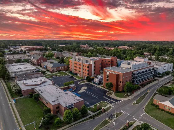 stock image Aerial view of Fayetteville State University public historically black university in Fayetteville, North Carolina with dramatic colorful sunset sky