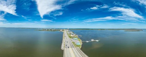 stock image Aerial view of Pond Island Outer Banks NC OBX, coastal highway connecting the outer islands to the mainland with marina, luxury vacation homes, causeway