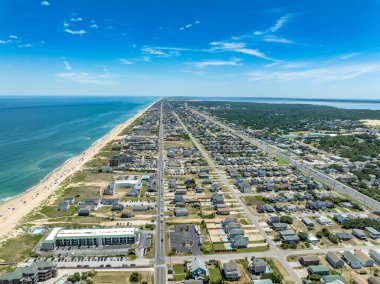 Aerial view of Kitty Hawk Beach with multiple vacation rental properties clipart