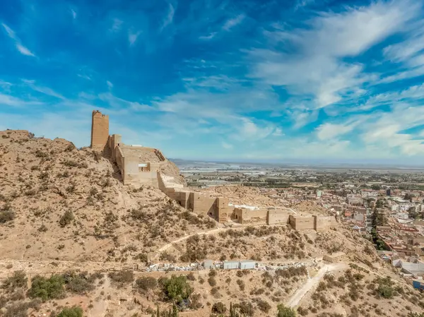 stock image Aerial view of Alhama castle with large square keep restored Iberian settlement ruins in Southern Spain Murcia province