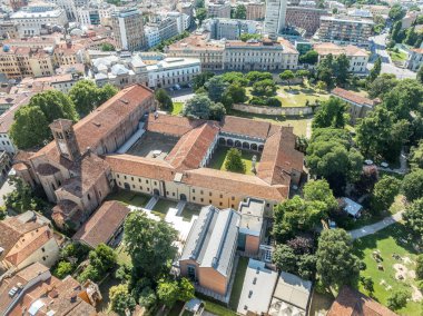 Aerial view of the Scrovegni chapel in Padova Italy lined with renowned early-14th century frescoes by Giotto, Cappella Sanguinacci and Roman Arena   clipart