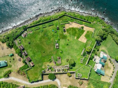 Aerial view of Charles fort in Sandy Point Town St Kitts and Nevis, pentagonal British colonial stone  fortification with angled bastions clipart