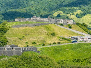 Former British citadel Brimstone Hill fort with cannons mounted on the bastions, caponier protecting the ditch in St Kitts clipart