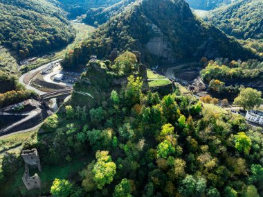 Aerial view of Are castle in Altenahr Germany, medieval hilltop ruined fortress with walls and towers above the river clipart