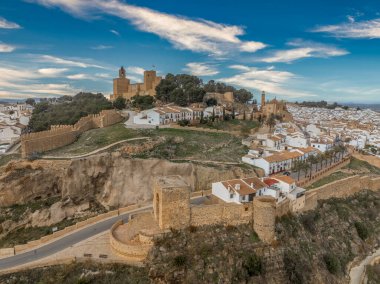 Aerial view of Antequera Moorish fortress with rectangular keep, city walls in Andalusia Spain clipart