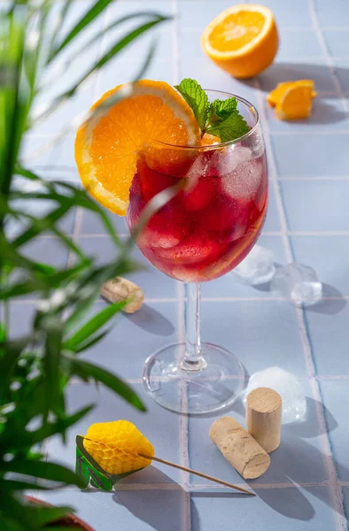 Tinto de Verano or vino de verano, Red wine Spanish cocktail with orange. Refreshment acoholic drink sangria. Summer Cool iced alcohol beverage