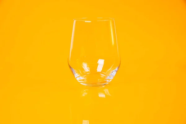 empty glass empty jar empty ice bucket on orange background top front view isolated