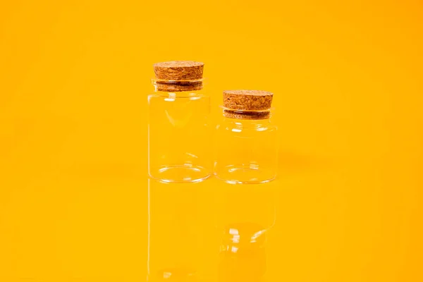 empty glass empty jar empty ice bucket on orange background top front view isolated