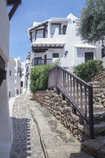 stock image Streets and white walls of touristic fishing village of Binibeca Vell in Menorca, Spain.