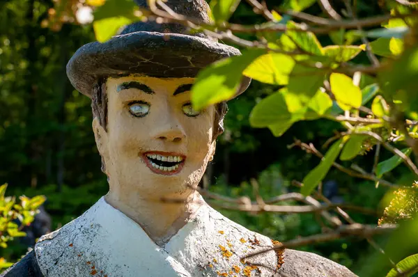 stock image Parikkala, Finland - June 11, 2023: Sculptures by artist Veijo Ronkkonen. The park Patsaspuisto has more than 500 statues created by one person over 50 years. An unusual, interesting and creepy place. The statues are made of concrete, metal, glass.