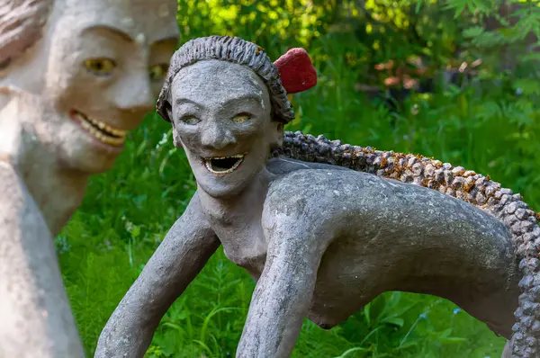 stock image Parikkala, Finland - June 11, 2023: Sculptures by artist Veijo Ronkkonen. The park Patsaspuisto has more than 500 statues created by one person over 50 years. An unusual, interesting and creepy place. The statues are made of concrete, metal, glass.