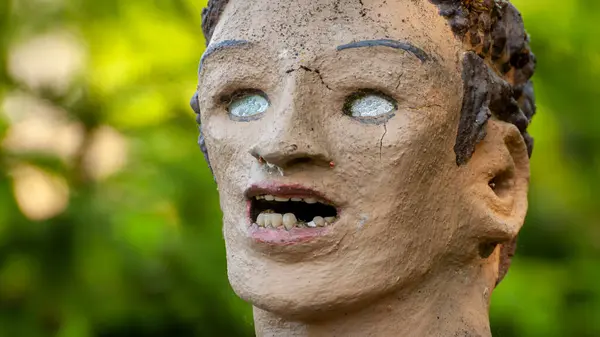 stock image Parikkala, Finland - June 11, 2023: Sculptures by artist Veijo Ronkkonen. The park Patsaspuisto has more than 500 statues created by one person over 50 years. An unusual, interesting and creepy place. The statues are made of concrete, metal, glass.