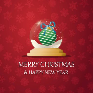 Kar altında bir Noel topuyla mutlu noeller kar küresi. Yeni yıl hediyesi. Tatil kavramı, kış tatili, yeni yıl, Noel