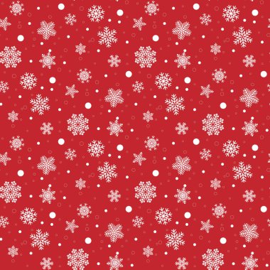Ambalaj kağıdının renkli arka planında beyaz kar taneleri. Noel tatili kavramı.