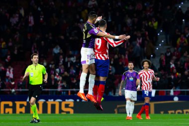 Madrid, Spain- January 21, 2023: Soccer match between Atletico de Madrid and Real Valladolid at Civitas Metropolitano. Alvaro Morata fights for a ball.