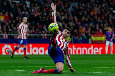Madrid, Spain- January 21, 2023: Soccer match between Atletico de Madrid and Real Valladolid at Civitas Metropolitano. Alvaro Morata fights for a ball.