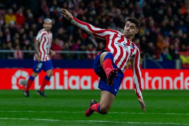 Madrid, Spain- January 21, 2023: Soccer match between Atletico de Madrid and Real Valladolid at Civitas Metropolitano. Alvaro Morata fights for a ball.