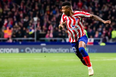Madrid, Spain- January 21, 2023: Soccer match between Atletico de Madrid and Real Valladolid at Civitas Metropolitano. Reinildo Mandava fights for the ball.