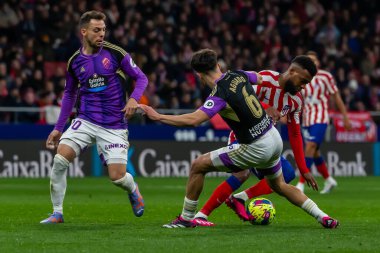 Madrid, Spain- January 21, 2023: Soccer match between Atletico de Madrid and Real Valladolid at Civitas Metropolitano. Thomas Lemar with the ball.