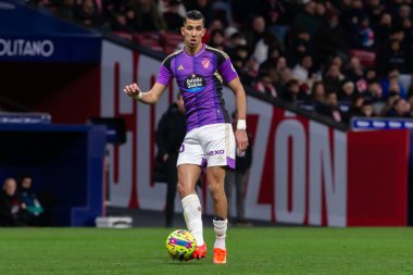 Madrid, Spain- January 21, 2023: Soccer match between Atletico de Madrid and Real Valladolid at Civitas Metropolitano. Jawad El Yamiq fights for the ball on the pitch.