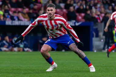 Madrid, Spain- January 21, 2023: Soccer match between Atletico de Madrid and Real Valladolid at Civitas Metropolitano. Rodrigo De Paul fights for the ball on the field.
