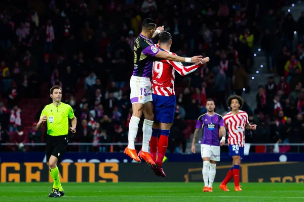 Madrid, Spain- January 21, 2023: Soccer match between Atletico de Madrid and Real Valladolid at Civitas Metropolitano. Alvaro Morata fights for a ball.